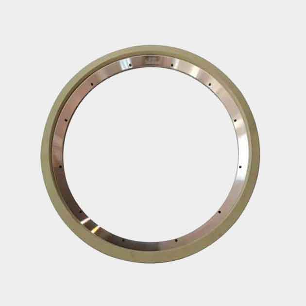 Ceramic binder around the grinding wheel